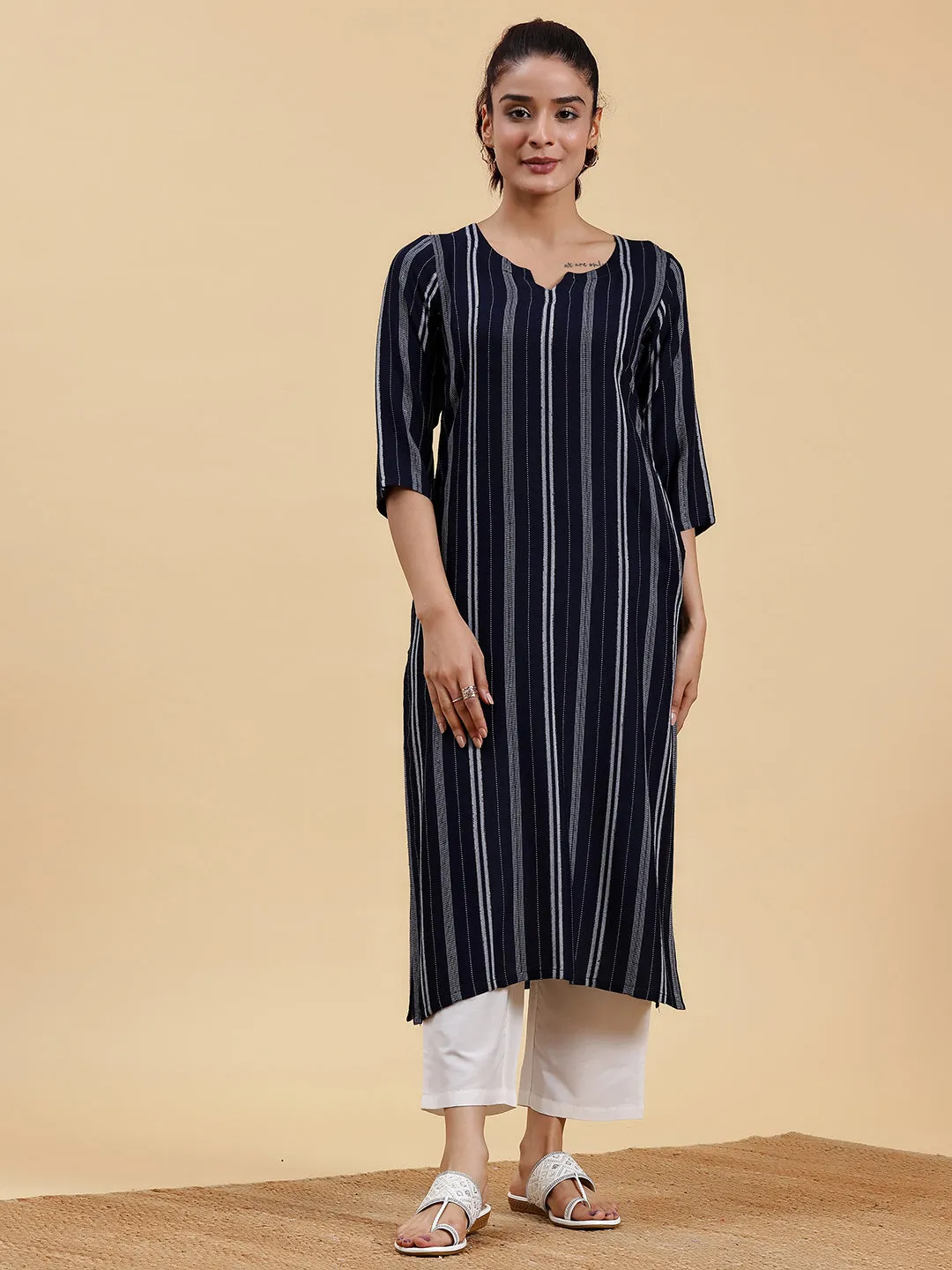 1_b4ebb095-f182-4a47-9992-9ab762981988.webp Navy Blue Woven Design Rayon Straight Kurta - Image 1