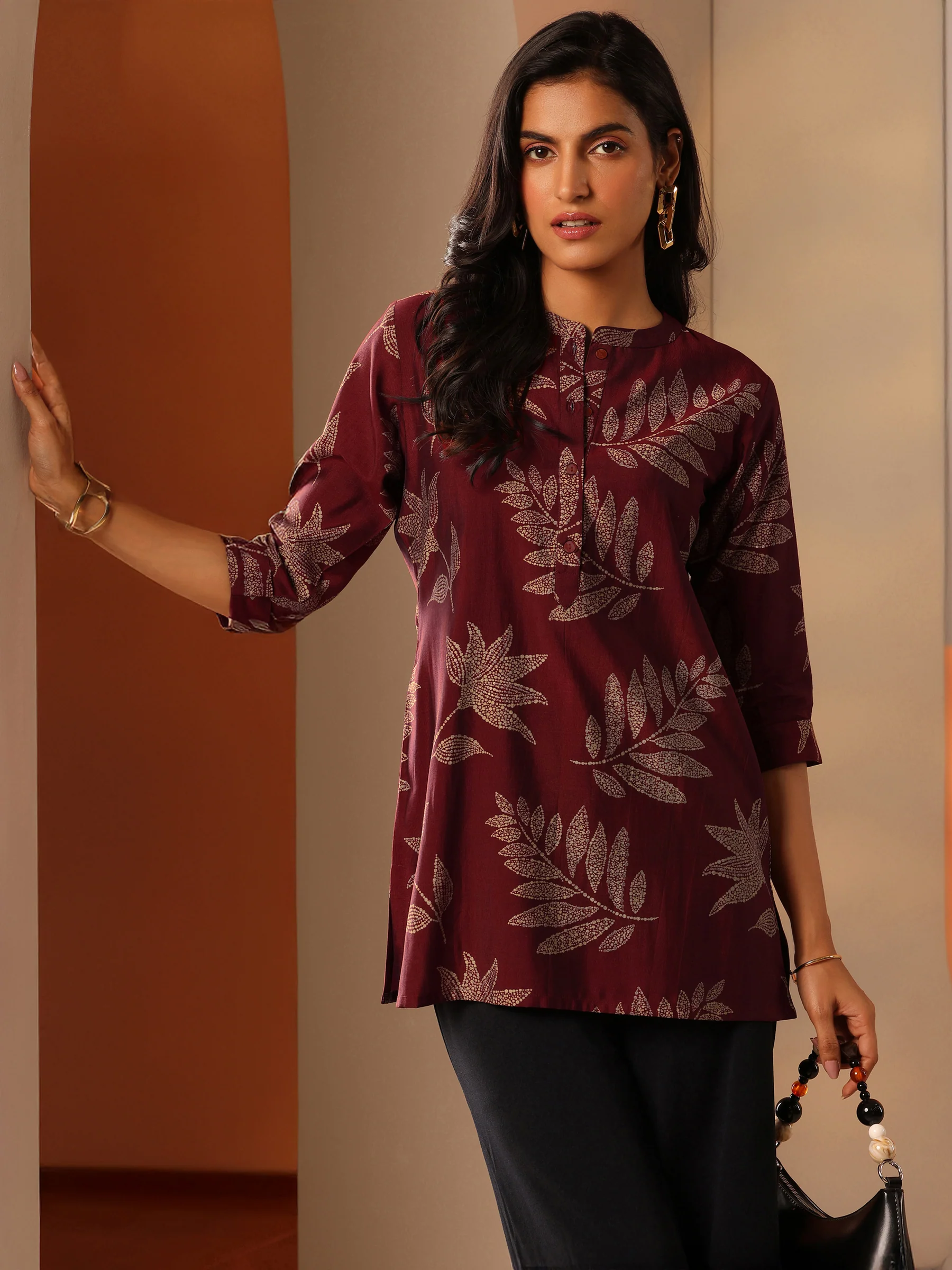29747_5MAIN_f8fdebe7-e50f-4138-b682-421cd2ab9696.webp Maroon Printed Silk Blend Straight Short Kurti - Image 1